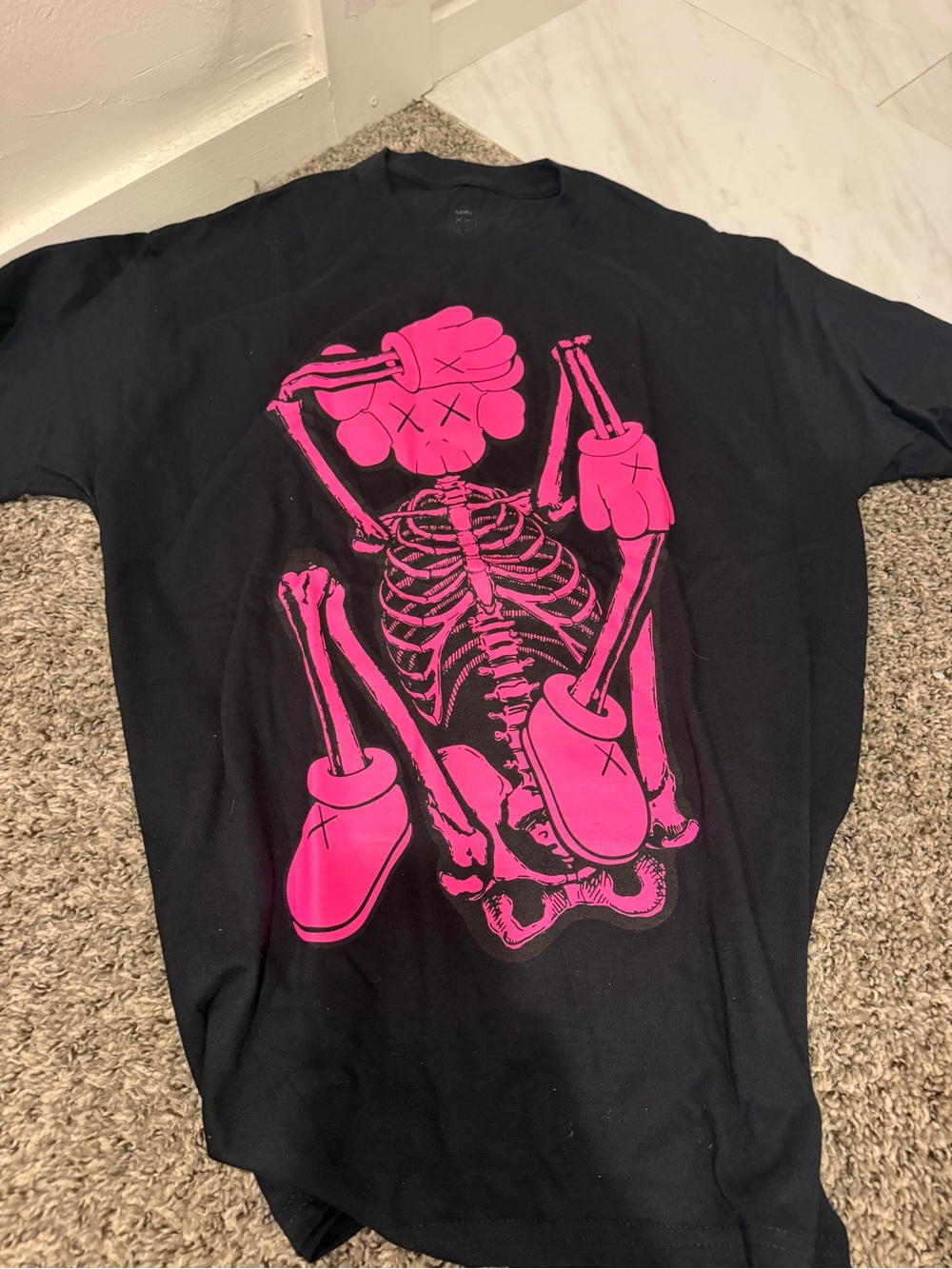 KAWS Kids Black Tee with Hot Pink Skeleton Graphic
